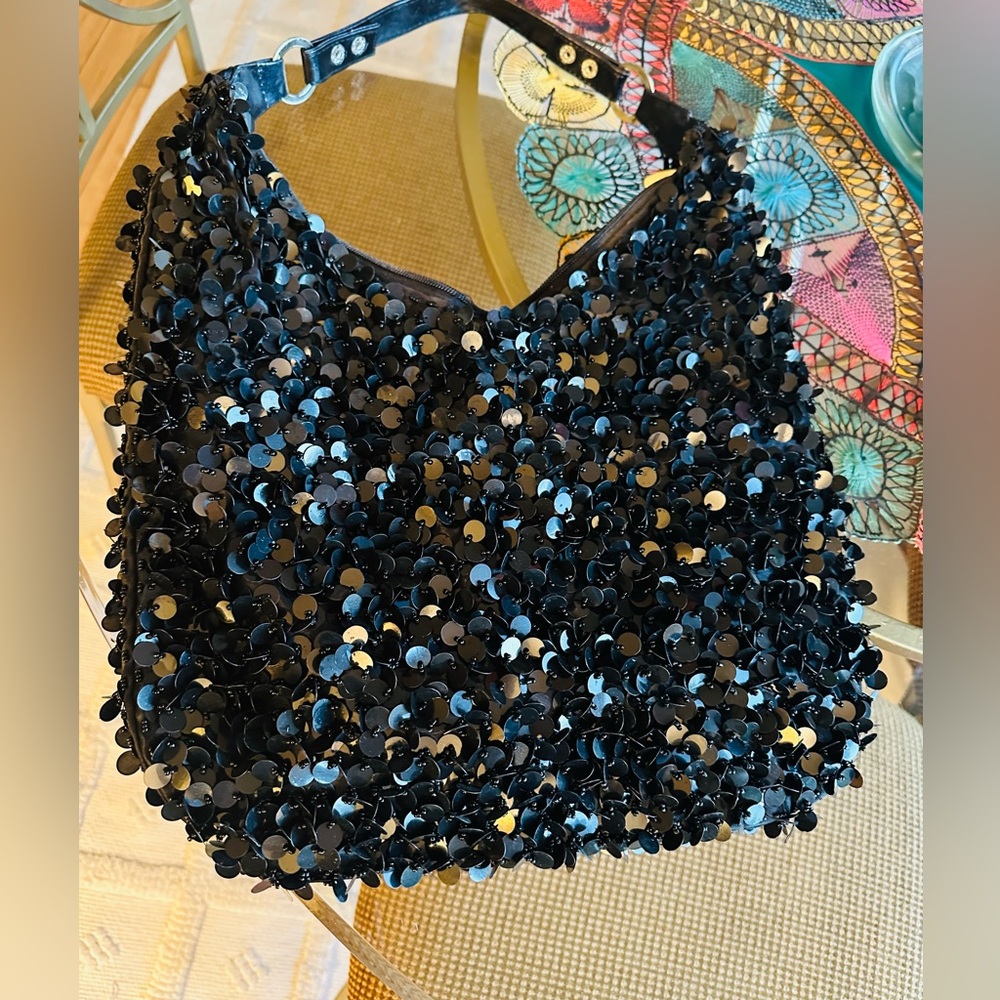 Black beaded and sequins covered bucket bag.